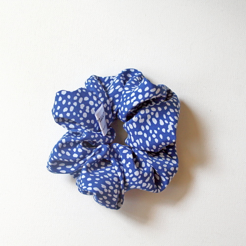 Плямка на синьому М