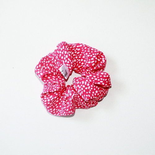 Плямка на червоному М